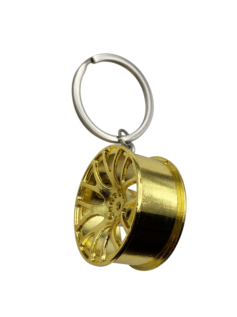Seitliche Ansicht vom Felgen Schlüsselanhänger Gold – hochwertiges Design mit realistischer Felgenoptik